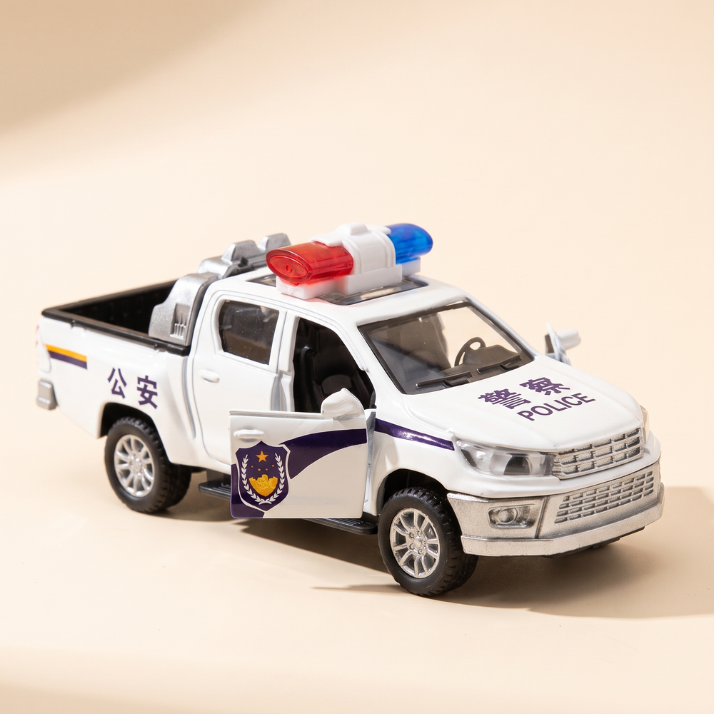 Diecast Ford pickup police toy car on warm cream studio background